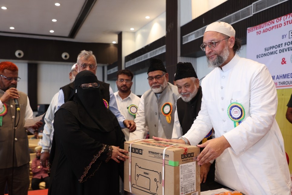 Sewing machine distribution to a craft-centre beneficiary